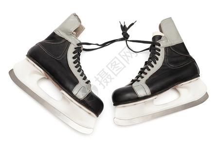 白色溜冰鞋白色背景的旧黑冰鞋背景