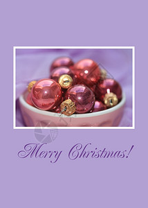 圣诞桌布一个碗粉红的圣诞节球紫色背景设计图片