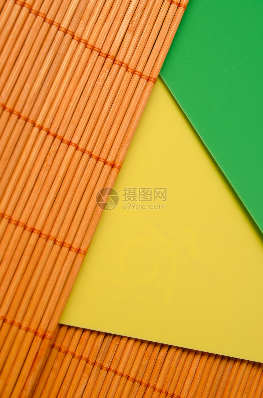 竹子和塑料垫抽象背景图片