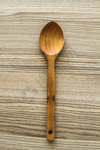 木制桌上勺子的厨房木制背景图片