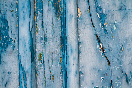 旧蓝色裂开的木壁背景土纹理图案图片