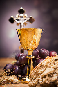 圣物经面包和葡萄酒背景图片