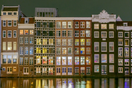 荷兰阿姆斯特丹运河岸边的传统住宅法卡迪斯  图片