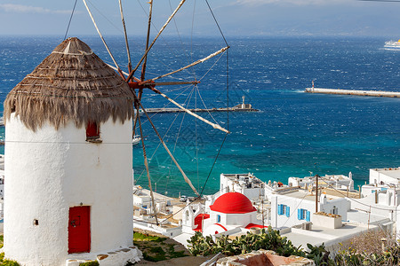 白色的风车米科诺斯古老的风车城市上山的白色风车希腊乔拉背景
