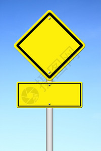 蓝色天空背景的白黄色交通标志图片