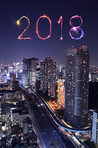 2018年新烟火闪与东京市风景在晚上日本背景图片