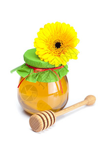 坚持把花儿和蜂蜜罐隔离在白色图片