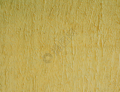 水泥黄色墙大体结构的碎块背景图片