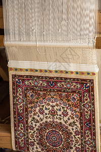 旧手制造传统类型的地毯和背景图片