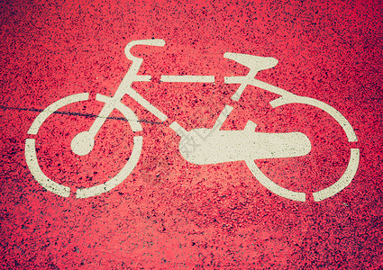 旧的自行车道上的Stencil自行车牌图片