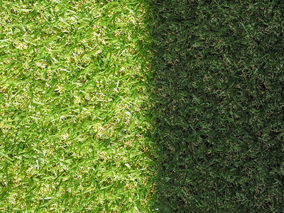 绿色人工合成草原背景绿色人工合成草质作为背景有用阳光和影子点背景图片