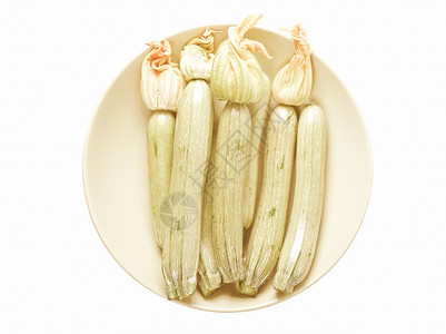 复古的西葫芦小胡瓜或西葫芦蔬菜食品的复古外观细节白色背景上隔离图片