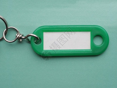 绿色钥匙环带有空白纸标签复制空间图片
