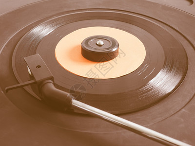 转角可式唱片的乙烯记录转角可式唱片播放器的乙烯记录单45rpm盘老旧图片