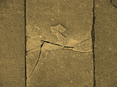 破碎的石头塞皮亚碎裂的石头在人行道上图片