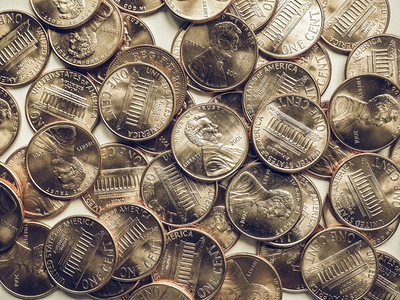 复古美元硬币背景复古的美国美元硬币美国的货币可用作背景图片