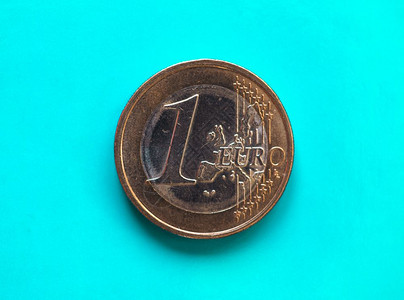 1欧元硬币洲联盟对绿色蓝1欧元硬币洲联盟对绿色蓝背景的货币图片
