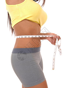 身穿运动服的瘦弱少女胃部不适身体分隔绝于白色背景图片
