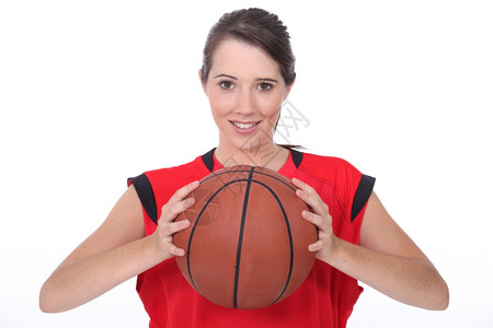 一名年轻女篮球运动员背景图片