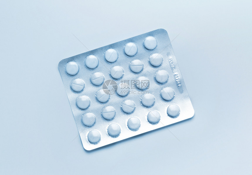 蓝色医疗背景摘要装有在水泡中的药丸图片