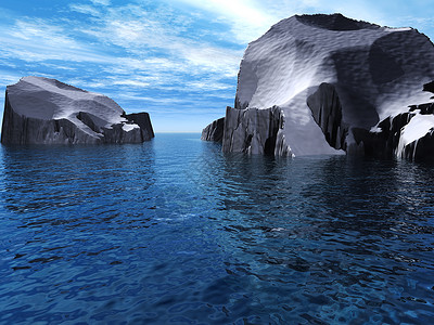 寒冷的两座冰山是北极洋蓝天背景图片