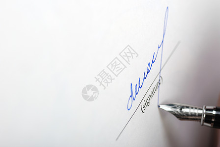 纸张纹理和签字笔用独有的签字确认文件图片