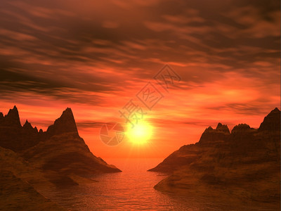 海湾的红日落洋与山峰的下降非常明亮图片