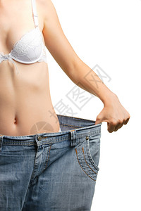 女和大体小的牛仔裤变薄概念在白色背景上被孤立背景图片