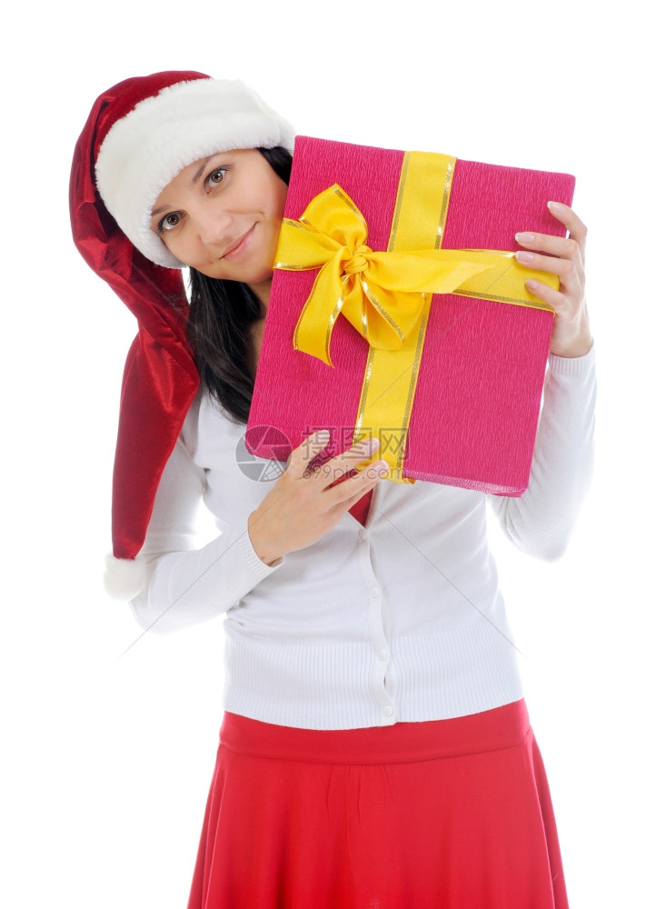 带着礼物的红圣坦塔帽诞微笑着女士被白种背景孤立图片