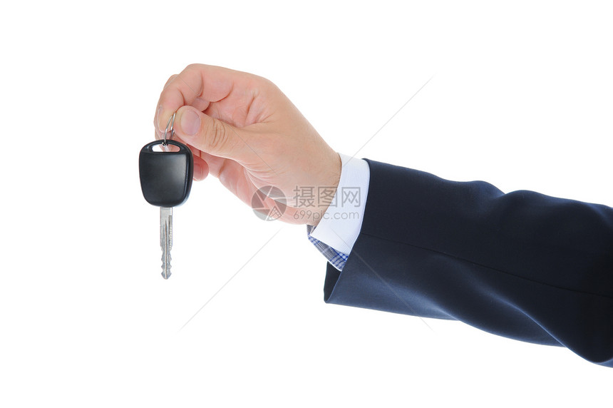 商人把车钥匙给孤立在白色上图片