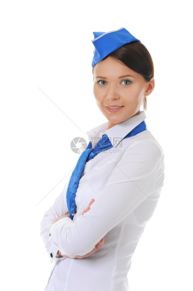 被白色背景孤立的迷人年轻空姐图片