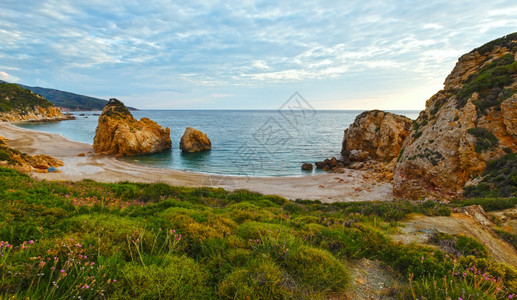 Potistika海滩日出风景希腊爱琴海图片