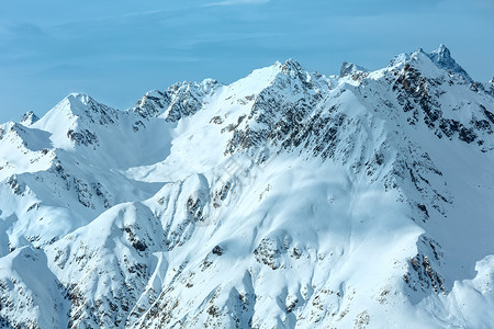 温雪岩石山顶奥地利蒂罗尔锡夫雷塔阿卑斯山高清图片