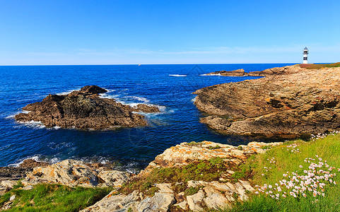 夏季海洋岛屿Pancha海岸线风景与灯塔西班牙图片