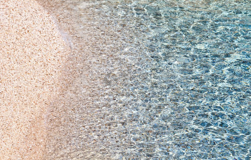 蓝海波纹流水面小海滩上有波浪自然背景图案图片