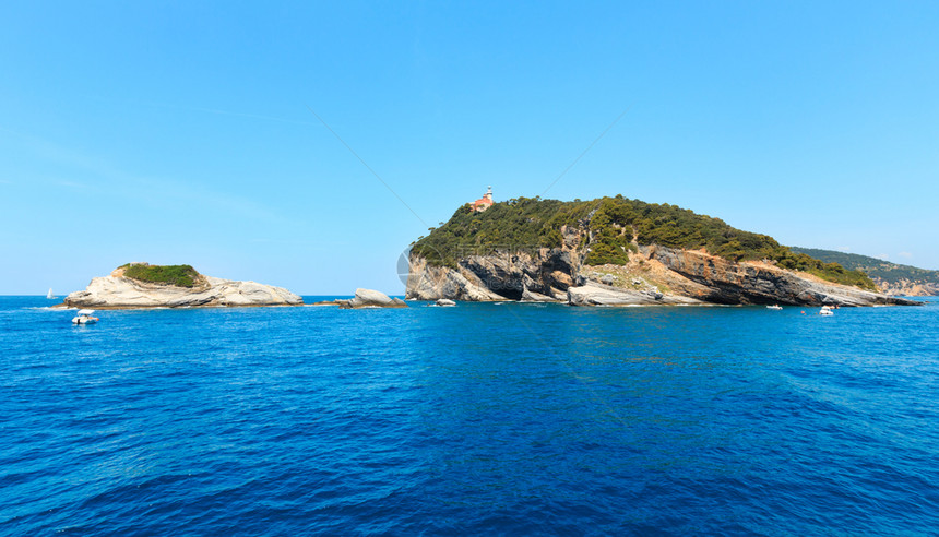 美丽的岩石海岸帕尔马里亚蒂诺和蒂内托群岛附近的波托维内尔诗人湾CinqueTerre公园拉斯佩齐亚利古里亚意大利蒂诺岛上的灯塔图片