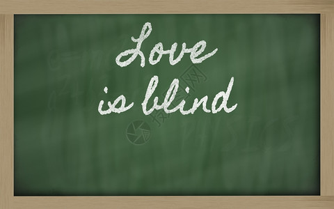 笔迹黑板写作爱是盲目的背景图片