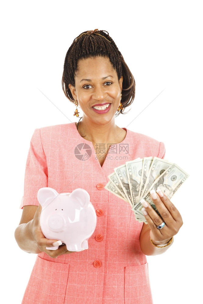 美女在小猪银行存钱孤立在白色上图片