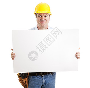 友善的建筑工人拿着空白的色标志孤立在白色上图片