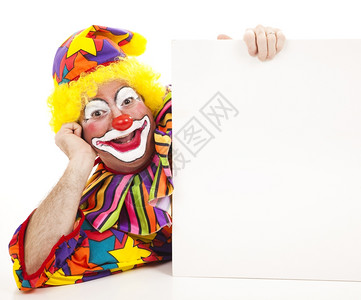 小丑躺在他身边拿着白的标牌图片
