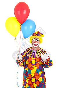 小丑拿着一堆气球挥舞孤立在白色上图片