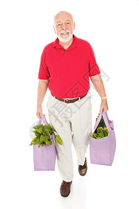 老人用可再布购物袋把杂货带回家全身被隔离图片