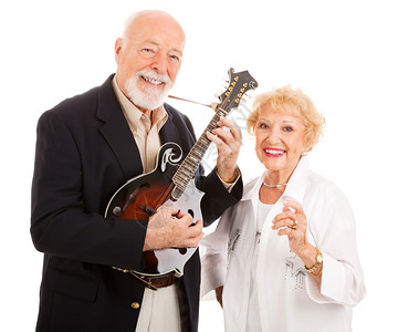 年长者用曼陀林弹奏音乐而妻子则随同歌唱图片