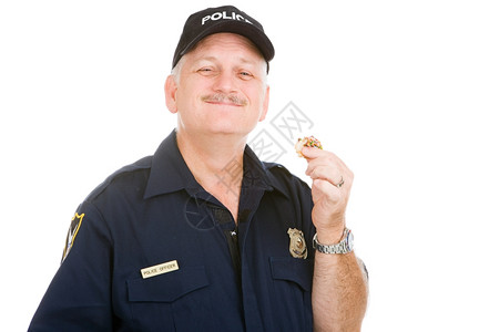 警官喜欢结束一个甜圈孤立于白人图片