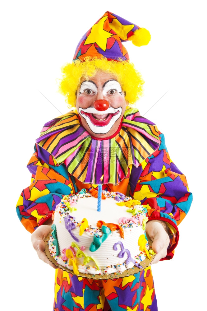 拿着生日蛋糕的多彩小丑孤立在白色上图片