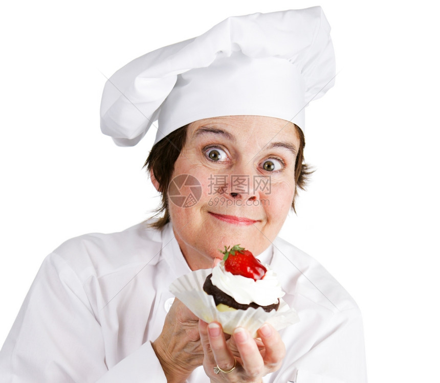 糕点厨师对她的新创作很兴奋孤立在白色上图片