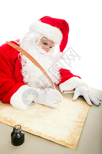圣诞老人在纸上写圣诞名单用笔和墨水写字背景图片