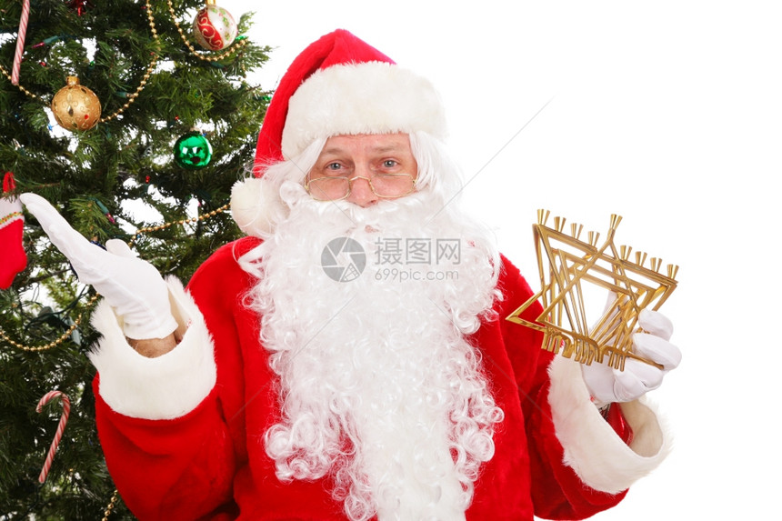 圣诞老人站在树前面抱着月经图片