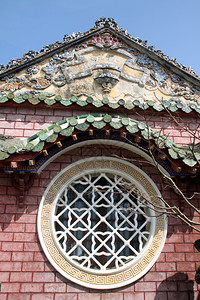 越南霍安古老的文名寺庙圆窗口和墙壁图片