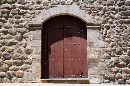 门施利赫玻利维亚波托西SanFrancisco教堂的石墙和大门背景